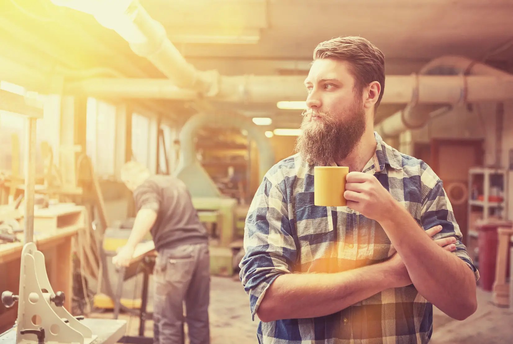 pay yourself from small business man standing