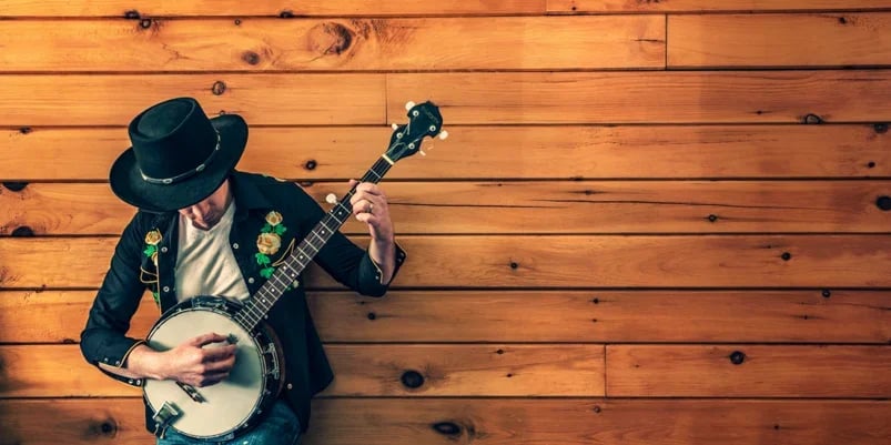 payroll solutions for industries man playing guitar